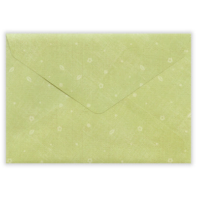 Green textured envelope on a white background