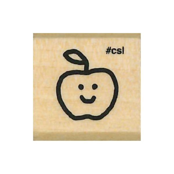 Rubber stamp with a smiley face apple design on a beige background