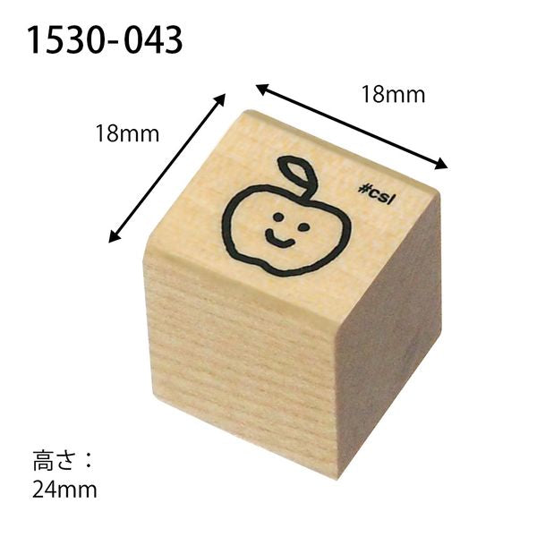 Wooden stamp with an apple design and measurements on a white background