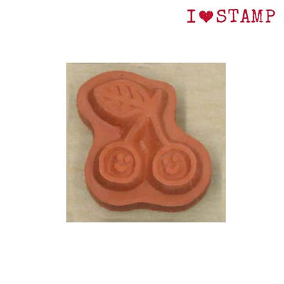Red rubber stamp with scissors design on a wooden block, branded 'I ❤️ STAMP'.