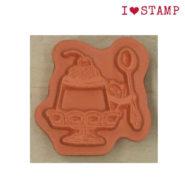 Decorative stamp with a design of a dessert and spoon on a beige background, featuring &