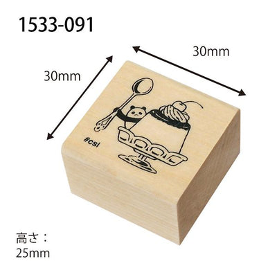 Wooden stamp block with panda design and measurements on a white background