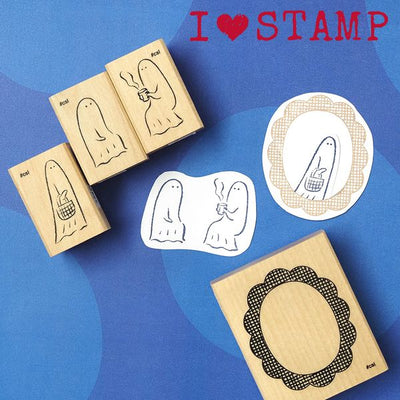 Set of rubber stamps with various designs on a blue background, featuring the text 'I ❤️ STAMP'.