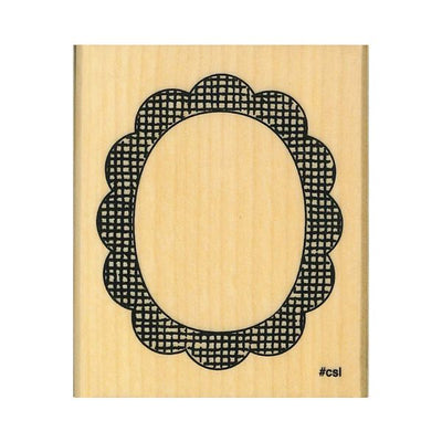 Wooden stamp with black decorative border on a white background