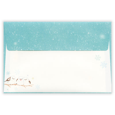 Envelopes with winter design featuring birds and snowflakes on a white background
