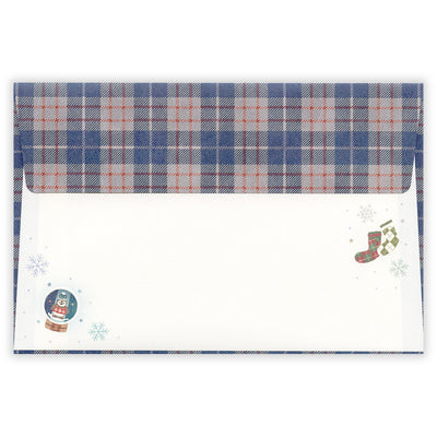 Plaid patterned envelope with Christmas designs on a white background