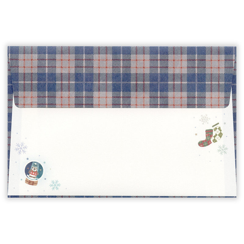 Plaid patterned envelope with Christmas designs on a white background