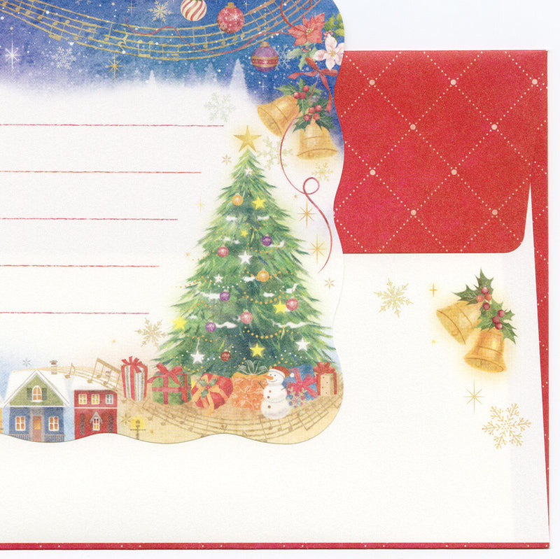 Christmas-themed letter with a decorated tree, presents, and snowman on a snowy landscape.