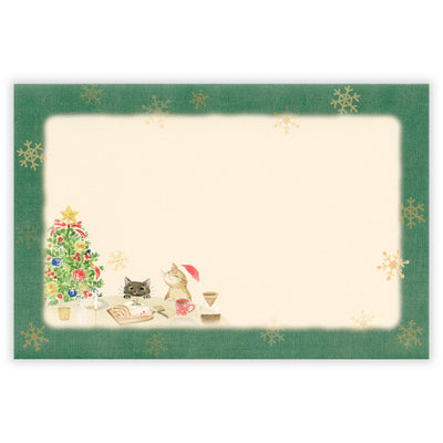 Christmas-themed card with a green border featuring a cat, dog, and Christmas tree.