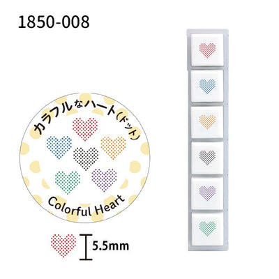 Colorful heart-shaped stamps with a circular stamp pad and a strip of stamped hearts on a white background.