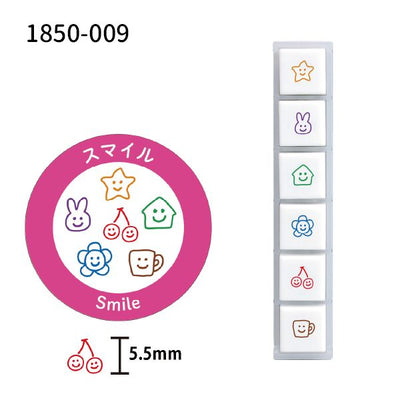 Set of colorful smiley face stamps with a circular design and text on a white background.
