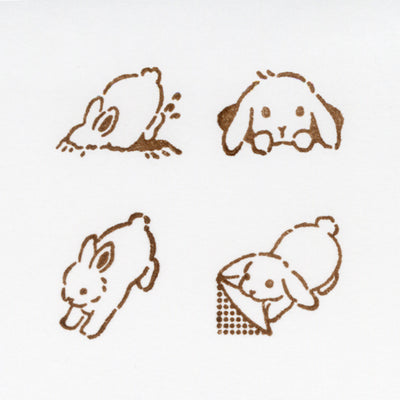 Set of four stylized illustrations of a rabbit in different poses on a white background.