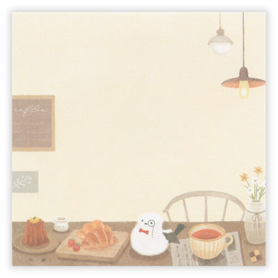 Illustration of a cozy kitchen scene with a bird, coffee, and pastries.