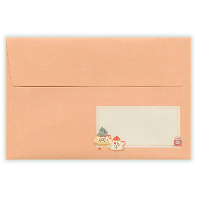 Peach-colored envelope with a cute illustration of a cat and teacup on a white background