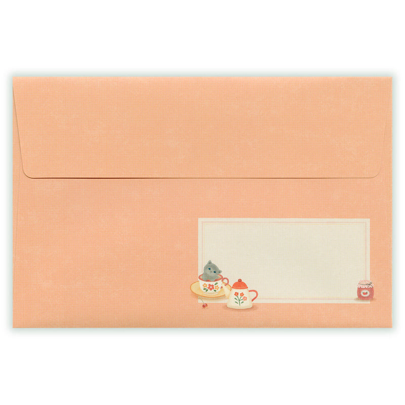 Peach-colored envelope with a cute illustration of a cat and teacup on a white background