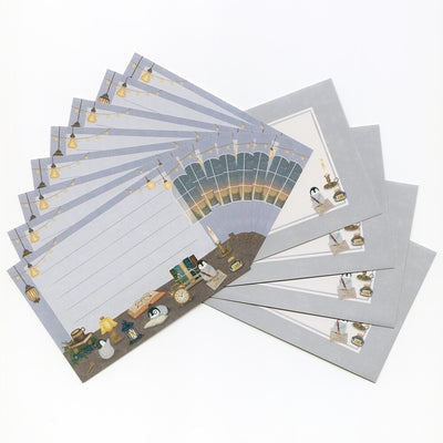 Set of stationery with illustrated designs on a white background