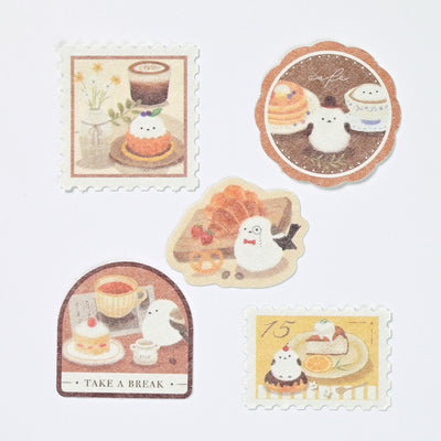 Set of cute illustrated stickers with animals and food on a light background