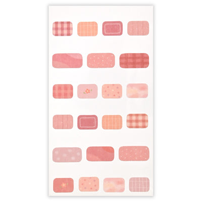 Sheet of pink and orange patterned stickers on a white background