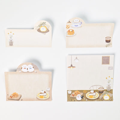 Set of stationery items with cute illustrations on a white background