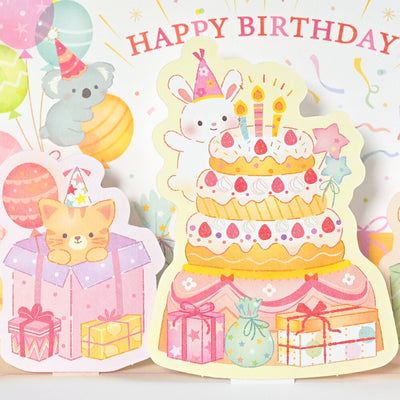 Illustrated birthday card with a cake, animals, and balloons on a white background.