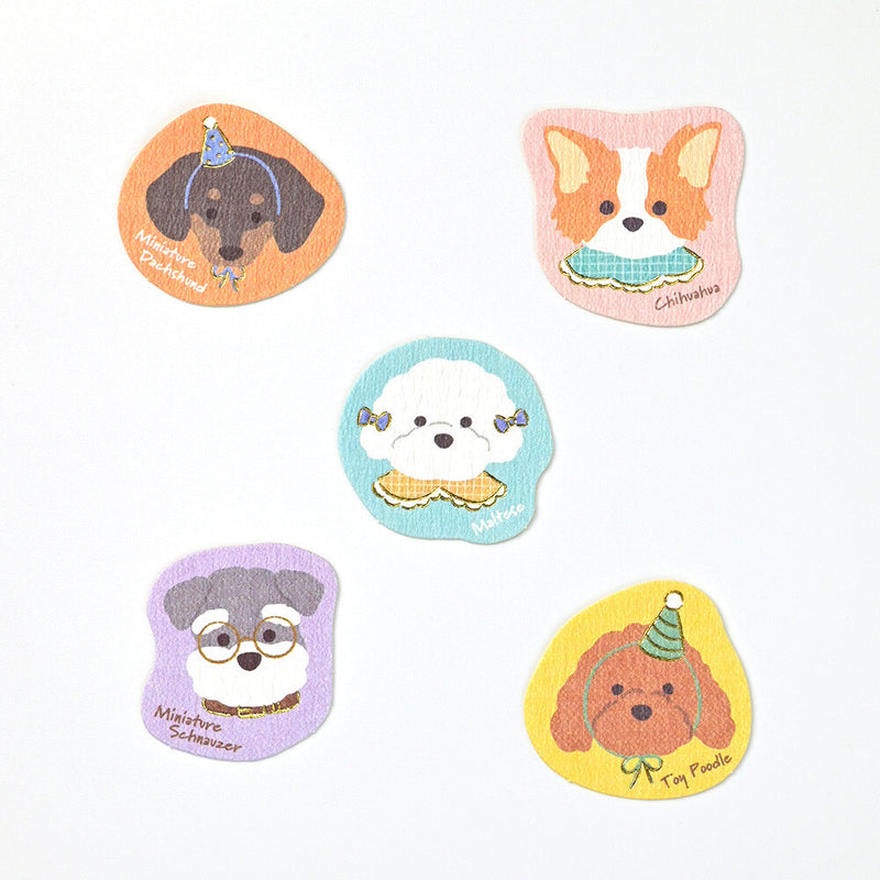 Set of five cartoon dog stickers with colorful backgrounds on a white background