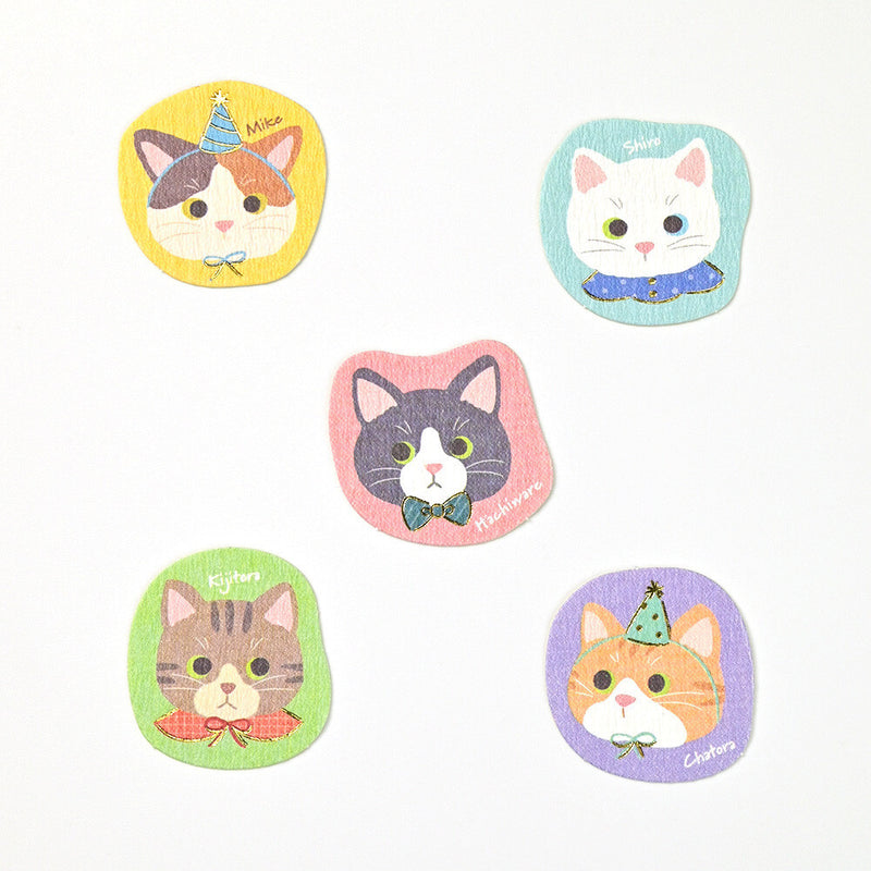 Set of five colorful stickers with cat designs on a white background