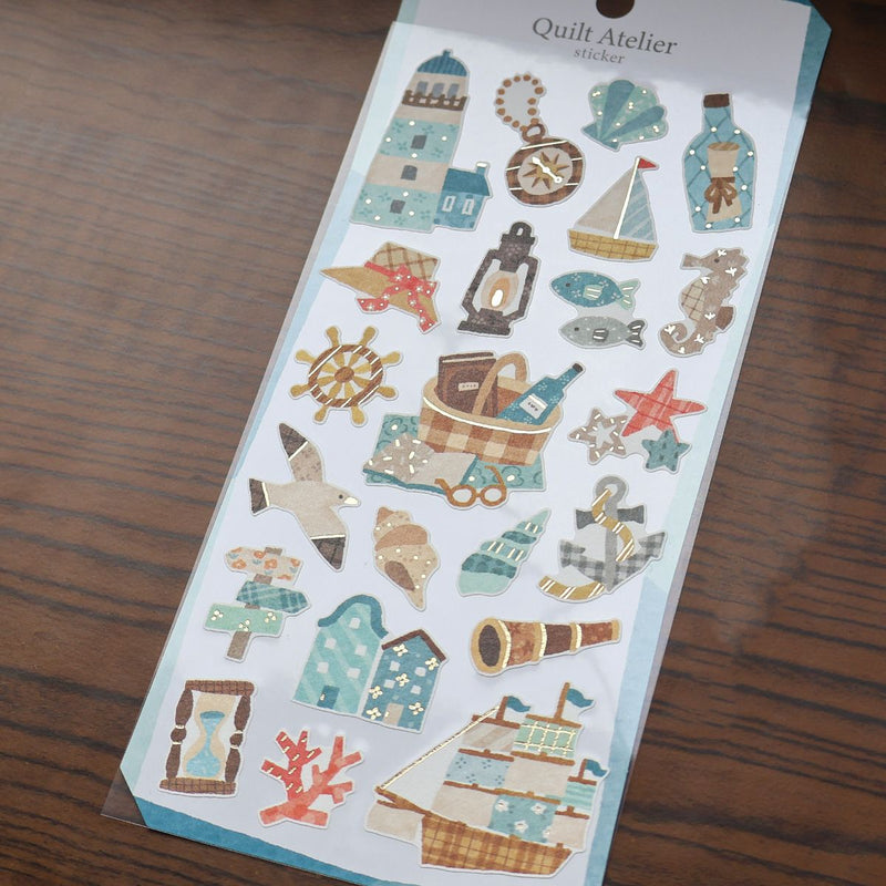 Sheet of decorative stickers with various designs on a wooden surface