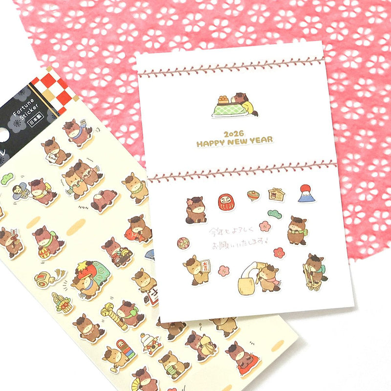 Sticker sheet with cartoon characters on a pink floral background