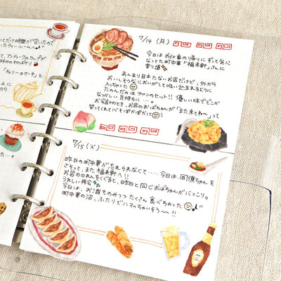 Notebook with food illustrations and text on a textured surface