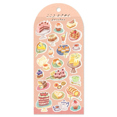 Pack of stickers with various dessert illustrations on a pink background