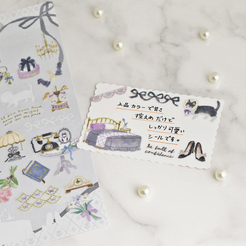 Set of decorative stickers with illustrations on a marble surface