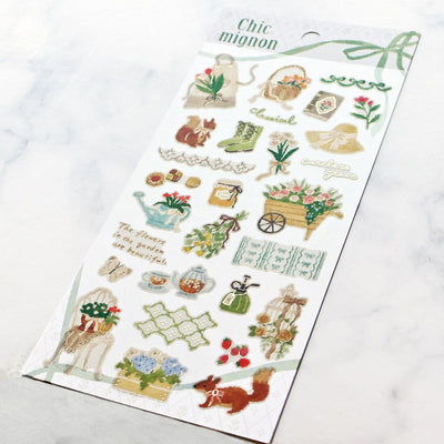 Sheet of decorative stickers with nature-themed designs on a white background