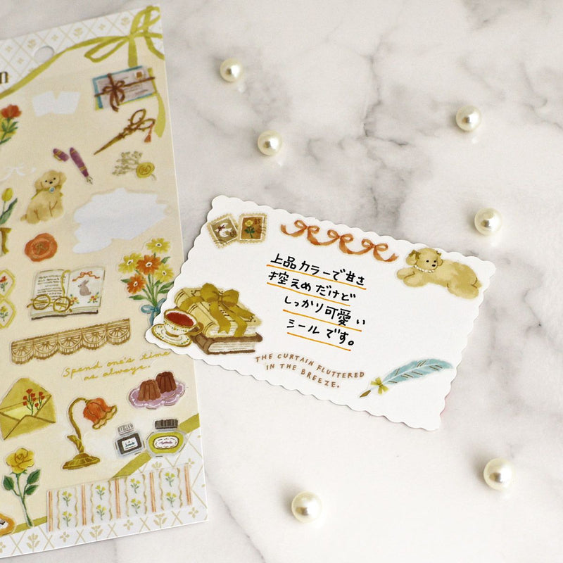 Decorative stickers with illustrations on a marble surface
