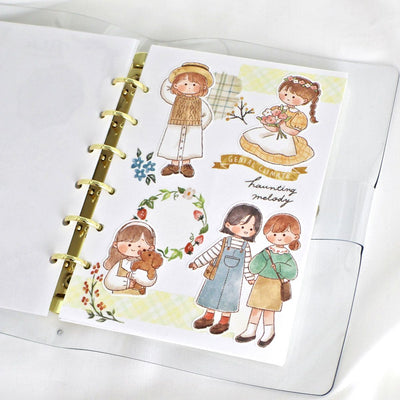 Illustrated planner with characters and decorative elements on a white background