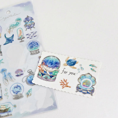 Decorative stickers with ocean-themed designs on a white background