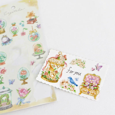 Decorative stickers with floral and nature-themed designs on a white background