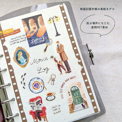 Sticker sheet with movie-themed designs on a planner or notebook cover.
