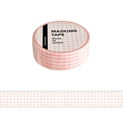 Masking tape with pink and white checkered pattern on a white background