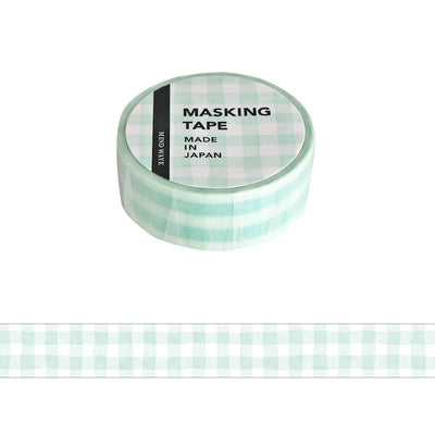 Roll of green checkered masking tape with 'Made in Japan' text on a white background