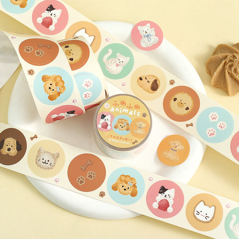 Set of animal-themed stickers on a white tray with a yellow background