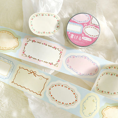 Decorative paper stickers with floral designs on a white surface