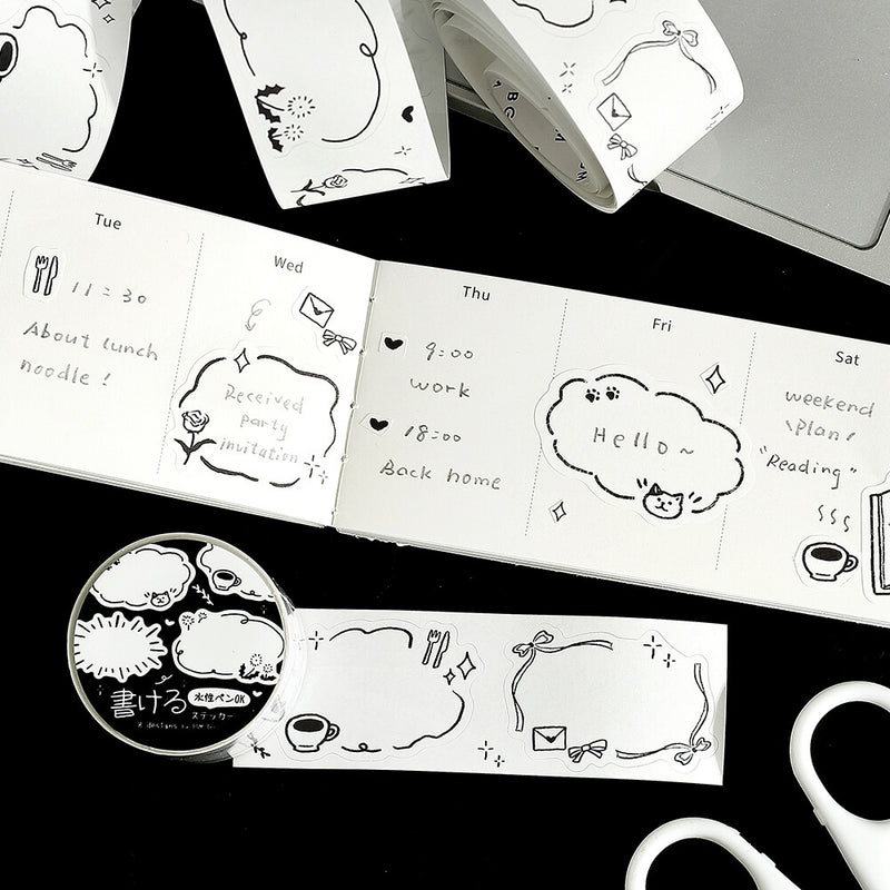 Black and white planner stickers with various designs on a black surface.
