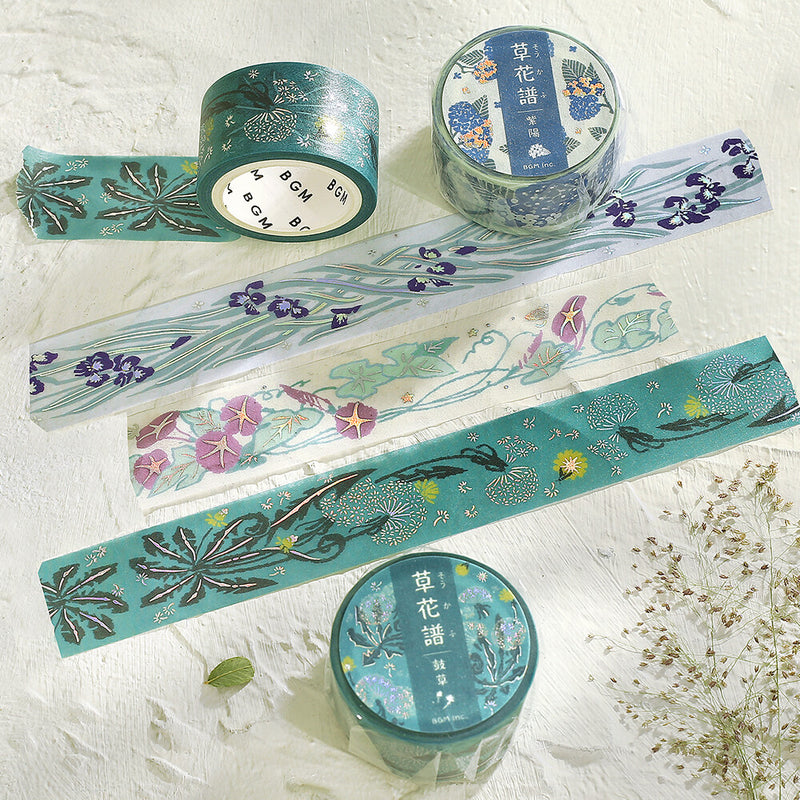 Set of decorative tapes with floral designs on a textured white background