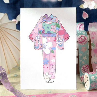Colorful kimono design on a white card with decorative elements in the background