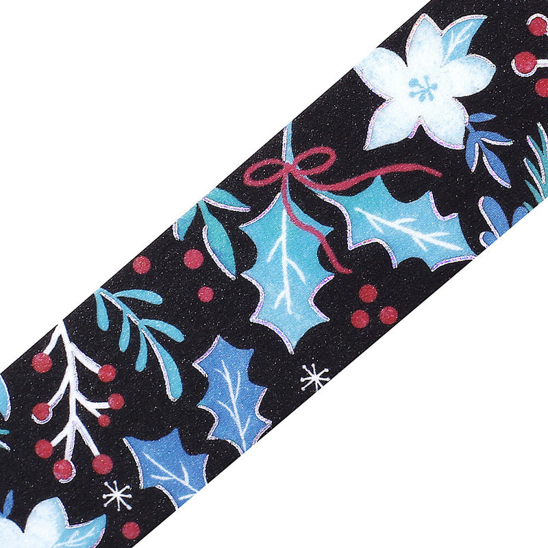 Decorative tape with holly leaves, berries, and snowflakes on a black background