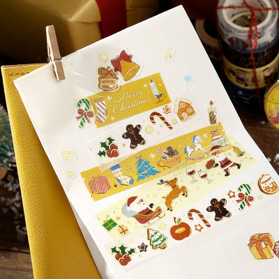 Sheet of Christmas-themed stickers with a paper clip on a white background.
