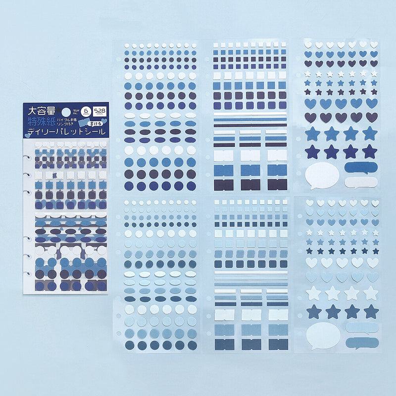 Collection of blue decorative stickers on a light blue background