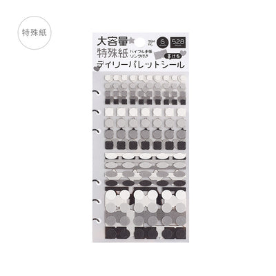 Packaging of black and white patterned stickers with text on a white background