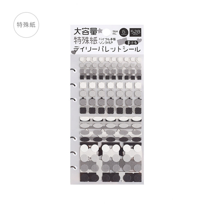 Packaging of black and white patterned stickers with text on a white background