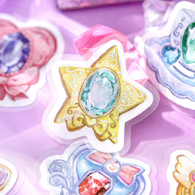 Decorative stickers with star and gem design on a purple background